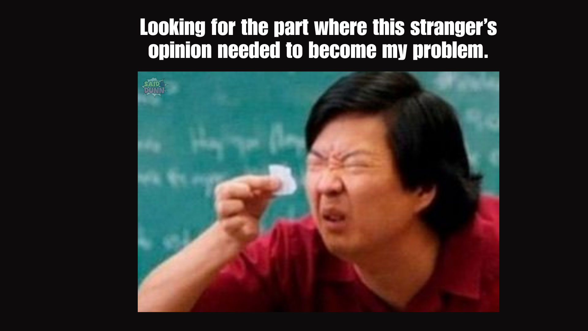 A meme featuring Ken Jeong's character from The Hangover squinting and holding a tiny piece of paper up to his face, with the bold text above reading, "Looking for the part where this stranger's opinion needed to become my problem."